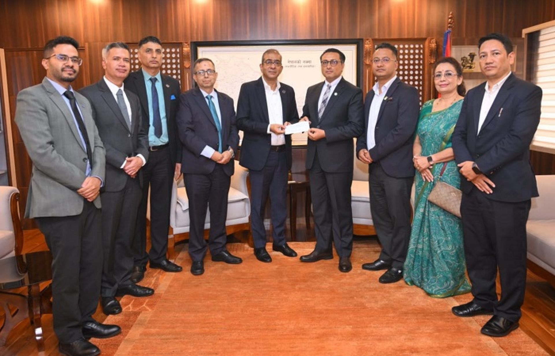 एनएमबि बैंकद्वारा भोटेकोशी बाढी प्रभावितका लागि तीन करोड ५१ लाख रुपैयाँ सहयोग